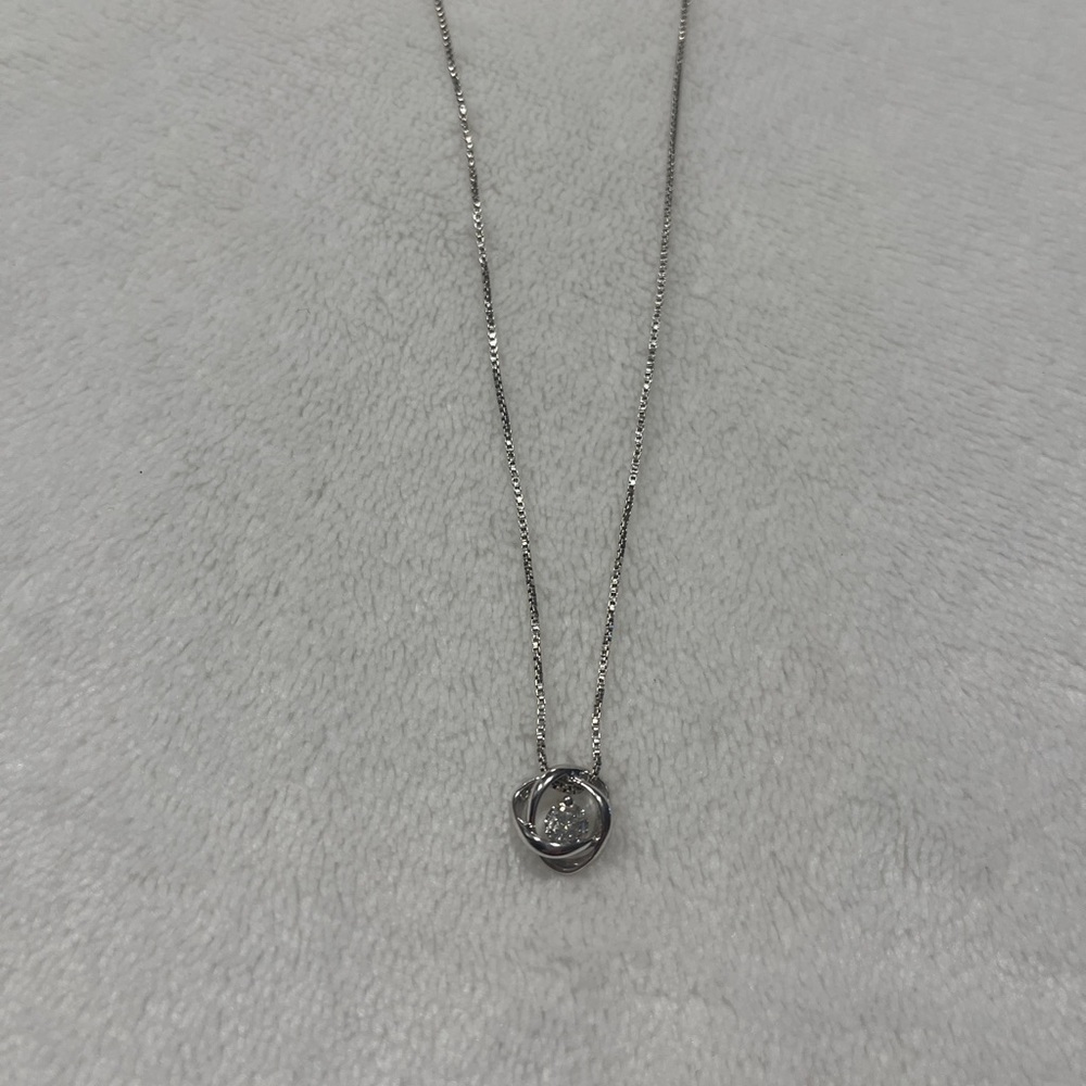 White gold diamond solitaire love knot necklace